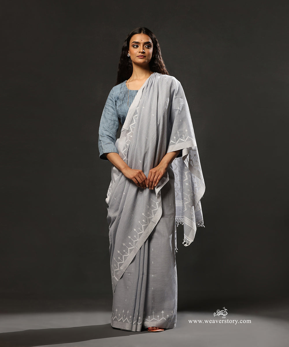 Dusty_Blue_Handloom_Pure_Mulmul_Dhakai_Jamdani_Saree_With_Saffron_Border_WeaverStory_01