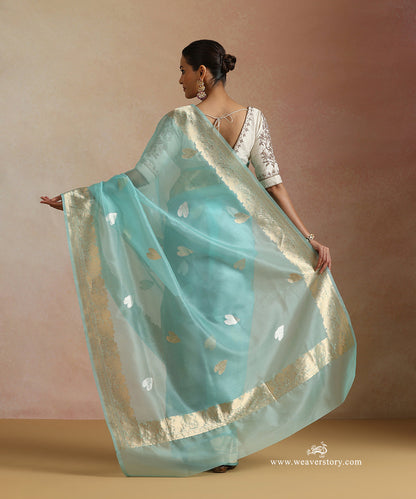 Ice_Blue_Pure_Kora_Silk_Banarasi_Saree_With_Kadhwa_Lotus_Leaf_Boota_With_Gold_Zari_Flower_Bel_WeaverStory_03