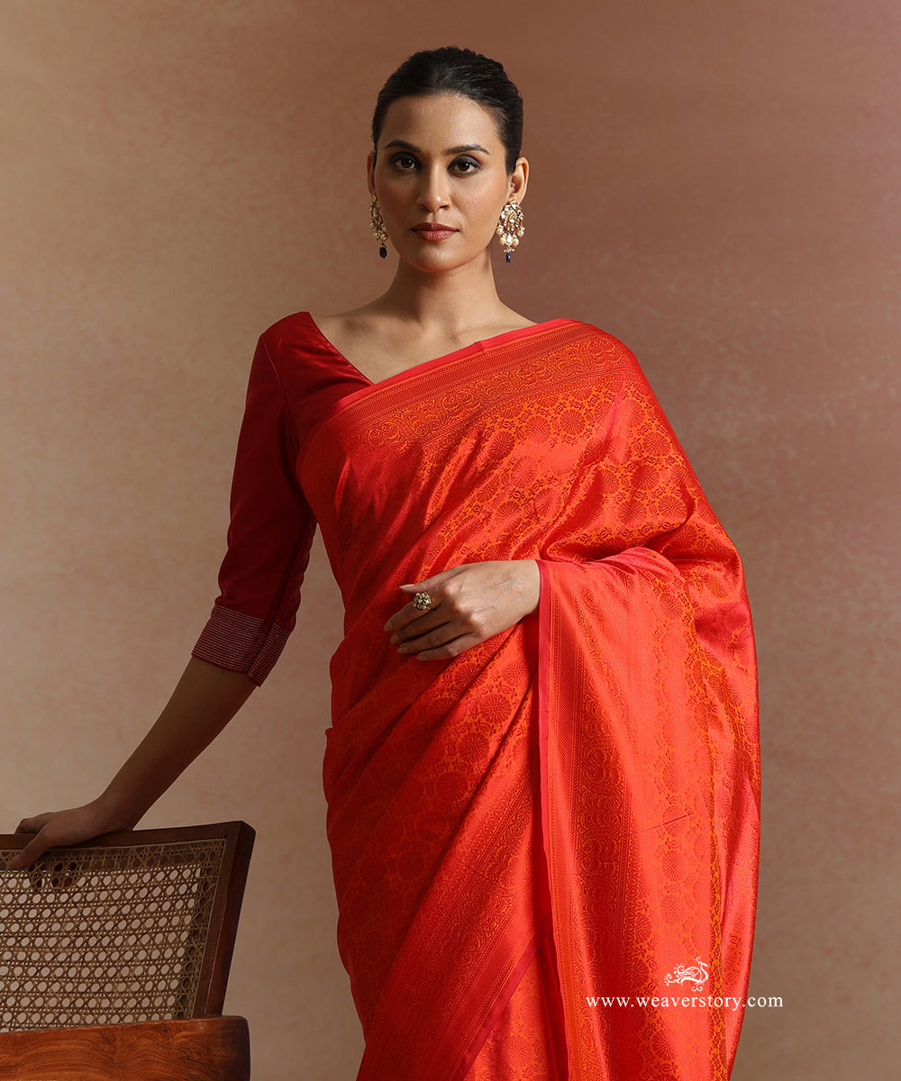 Orange_And_Red_Handloom_Pure_Katan_Silk_Resham_Tanchoi_Banrasi_Saree_With_Small_Floral_And_Red_Selvedge_WeaverStory_01