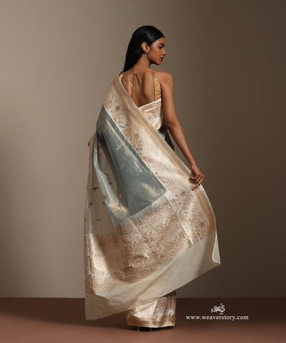 Pastel_Green_And_Baige_Handloom_Pure_Tissu_Silk_Banarasi_Saree_With_Katan_Silk_Kadiyal_Meenakari_Border_And_Gold_Silver_Motifs_WeaverStory_03