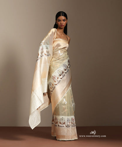 Pastel_Green_Handloom_Pure_Tissue_Silk_Banarasi_Saree_With_Katan_Silk_Kadiyal_Intricate_Resham_Work_Border_And_Small_Birds_Motifs_WeaverStory_01