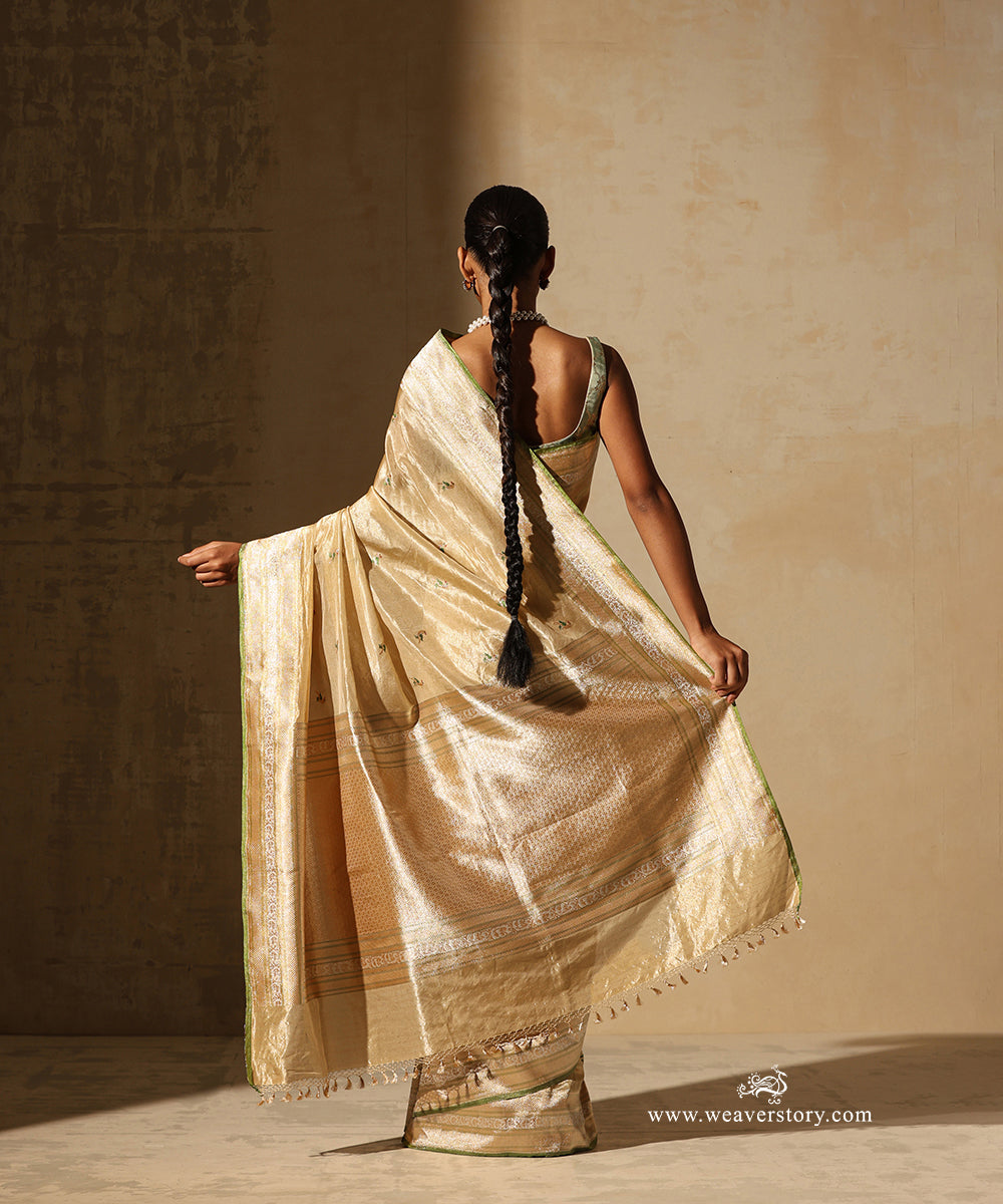 Gold Handloom Pure Tissue Silk Banarasi Saree With Small Parrot Motifs With Pista Meenakari And Selvedge