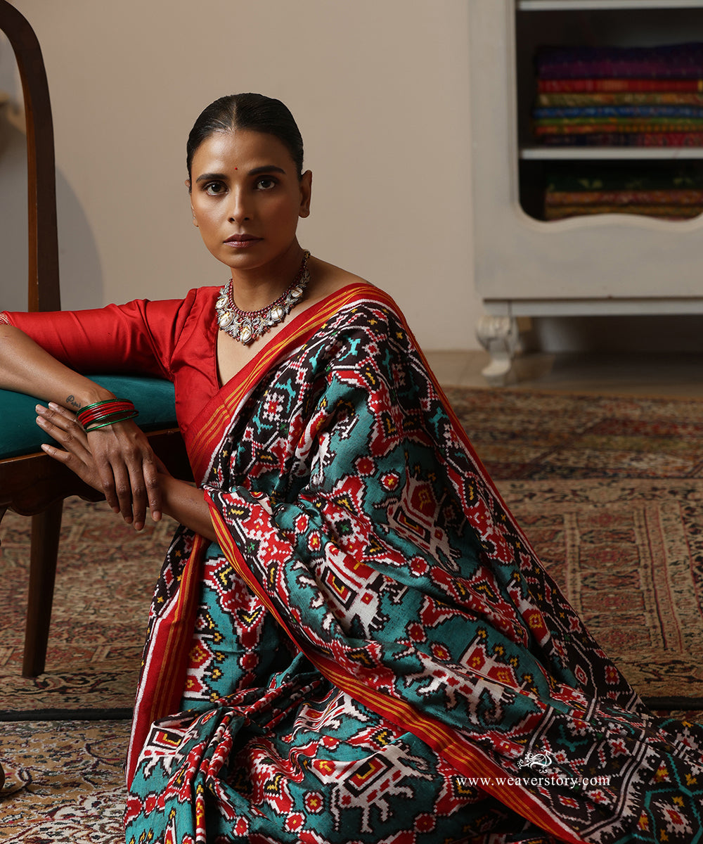 Red_And_Firozi_Handloom_Double_Ikat_Patola_Saree_With_Traditional_Big_Elephant_Motifs_WeaverStory_01