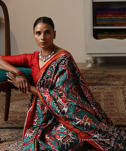 Red_And_Firozi_Handloom_Double_Ikat_Patola_Saree_With_Traditional_Big_Elephant_Motifs_WeaverStory_01