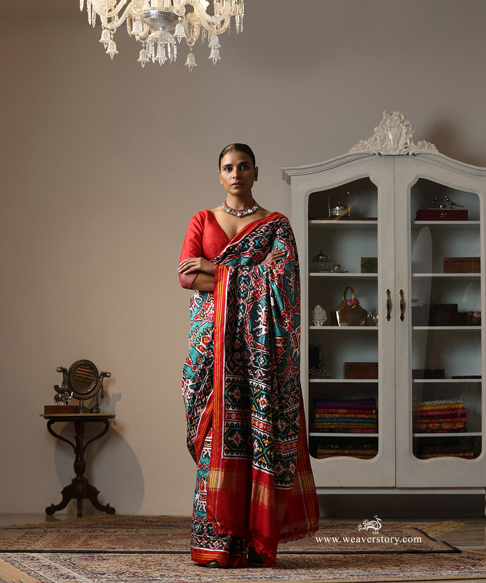 Red_And_Firozi_Handloom_Double_Ikat_Patola_Saree_With_Traditional_Big_Elephant_Motifs_WeaverStory_02