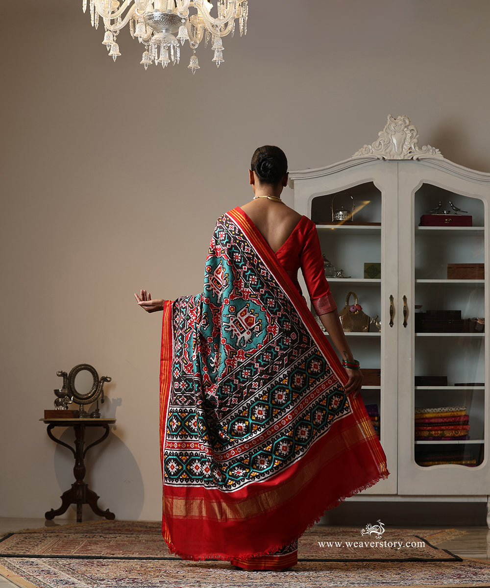 Red_And_Firozi_Handloom_Double_Ikat_Patola_Saree_With_Traditional_Big_Elephant_Motifs_WeaverStory_03