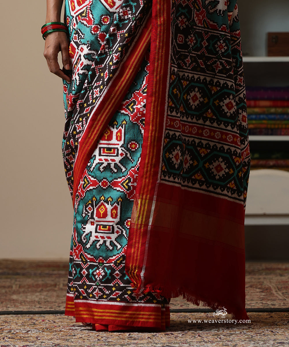 Red_And_Firozi_Handloom_Double_Ikat_Patola_Saree_With_Traditional_Big_Elephant_Motifs_WeaverStory_04