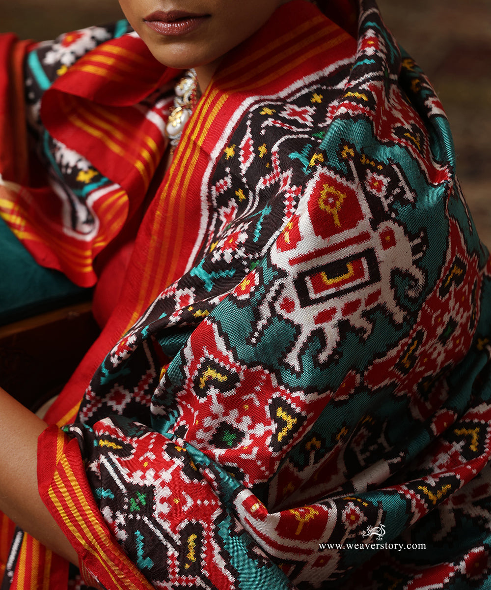 Red_And_Firozi_Handloom_Double_Ikat_Patola_Saree_With_Traditional_Big_Elephant_Motifs_WeaverStory_05
