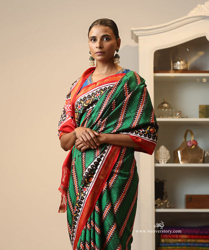 Green_And_Red_Handloom_Double_Ikat_Patola_Saree_WeaverStory_01