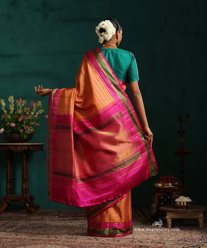 Burnt_Orange_Pure_Silk_Kanjivarm_Saree_With_Zari_Stripes_And_Pink_And_Green_Border_With_Rudraksh_Motifs_WeaverStory_03