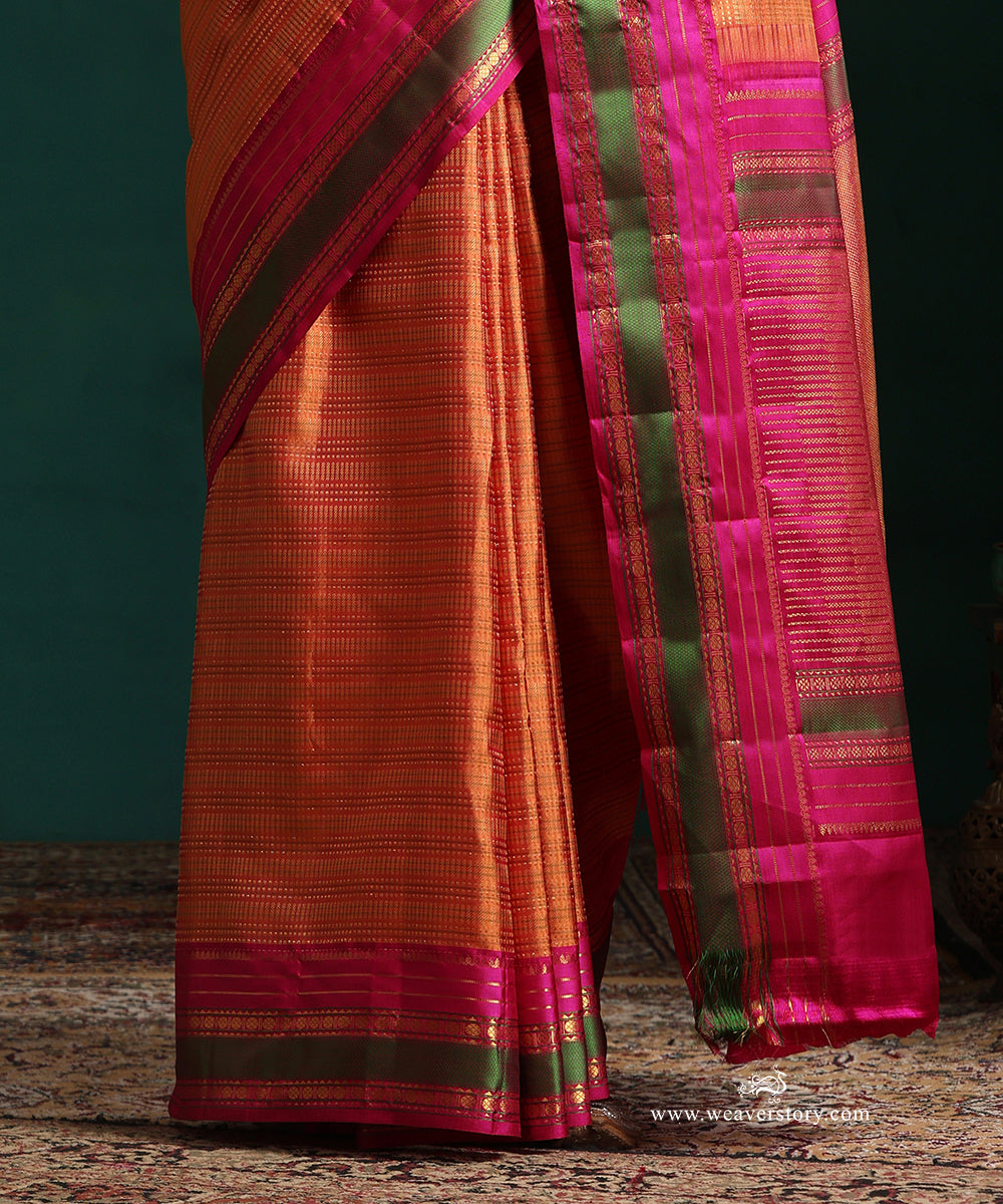 Burnt_Orange_Pure_Silk_Kanjivarm_Saree_With_Zari_Stripes_And_Pink_And_Green_Border_With_Rudraksh_Motifs_WeaverStory_04