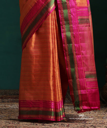 Burnt_Orange_Pure_Silk_Kanjivarm_Saree_With_Zari_Stripes_And_Pink_And_Green_Border_With_Rudraksh_Motifs_WeaverStory_04