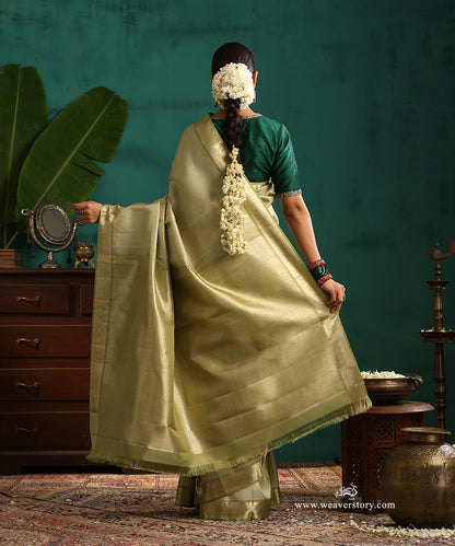 Soft_Green_Handloom_Pure_Silk_Kanjivaram_Saree_With_All_Over_Zari_Weave_And_Sage_Green_Korwai_Border_WeaverStory_03