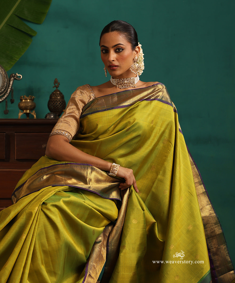 Fresh_Green_Handloom_Pure_Silk_Kanjivaram_Saree_With_Rudraksh_And_Annapakshi_Motifs_And_Purple_Korwai_Border_WeaverStory_02