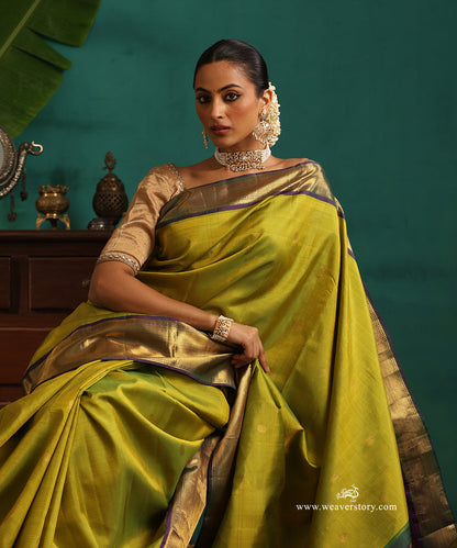 Fresh_Green_Handloom_Pure_Silk_Kanjivaram_Saree_With_Rudraksh_And_Annapakshi_Motifs_And_Purple_Korwai_Border_WeaverStory_02