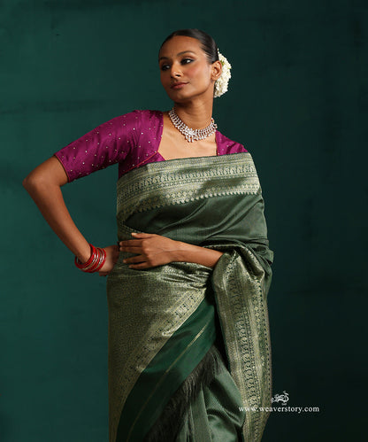 Bottle_Green_Pure_Silk_Kanjivaram_Saree_With_Antique_Silver_Zari_Stripes_And_Paisley_And_Annapakshi_Border_WeaverStory_02