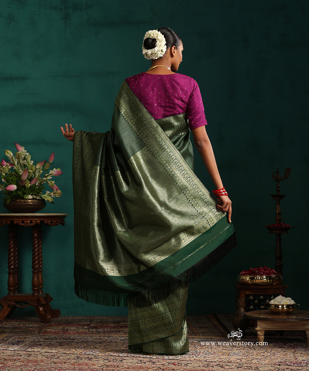 Bottle_Green_Pure_Silk_Kanjivaram_Saree_With_Antique_Silver_Zari_Stripes_And_Paisley_And_Annapakshi_Border_WeaverStory_03