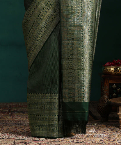 Bottle_Green_Pure_Silk_Kanjivaram_Saree_With_Antique_Silver_Zari_Stripes_And_Paisley_And_Annapakshi_Border_WeaverStory_04