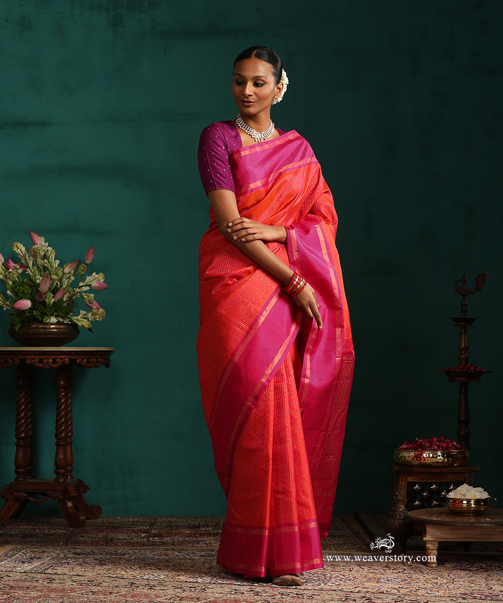 Burnt_Orange_Pure_Silk_Kanjivaram_Saree_With_Zari_Stripes_And_Majenta_Korwai_Border_WeaverStory_01