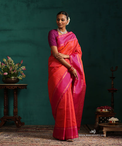 Burnt_Orange_Pure_Silk_Kanjivaram_Saree_With_Zari_Stripes_And_Majenta_Korwai_Border_WeaverStory_01