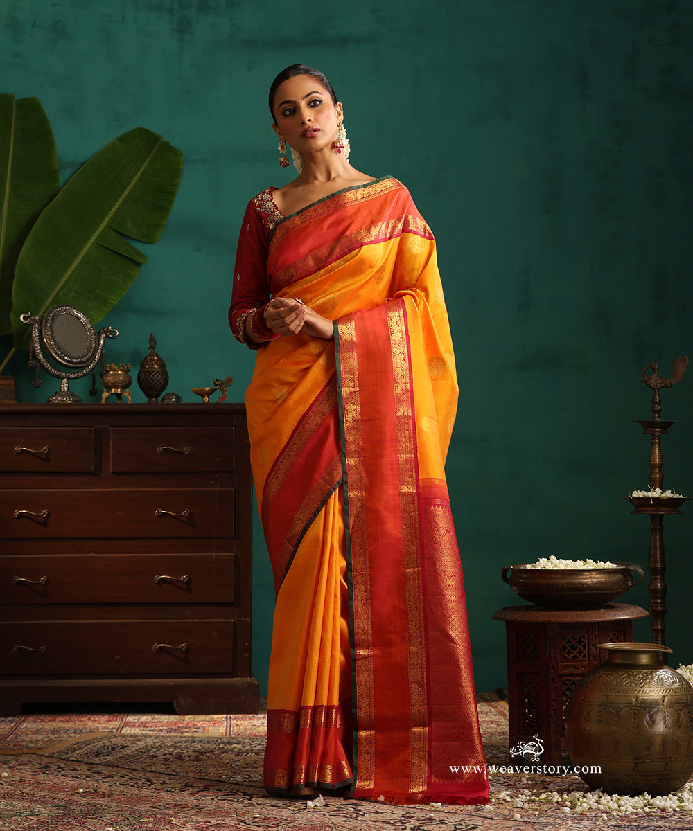 Mango_Yellow_Handloom_Pure_Kanjivaram_Saree_With_Bootas_And_Orange_And_Red_Elephant_Motifs_Korwai_Border_WeaverStory_01