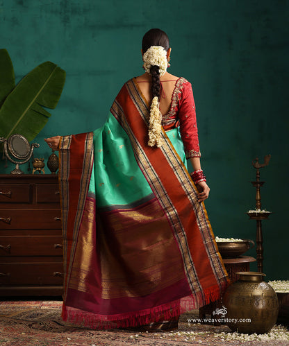 Aqua_Green_Handloom_Pure_Silk_Kanjivaram_Silk_Saree_With_Deer_Motifs_And_Rust_Korwai_Border_WeaverStory_03