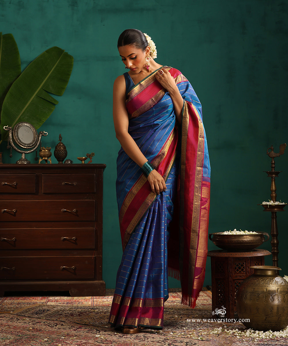 Blue_Handloom_Pure_Silk_Kanjivaram_Saree_With_Veldhari_And_Berry_Pink_Korwai_Border_WeaverStory_01