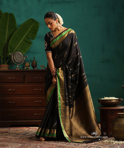 Black_Handloom_Pure_Silk_Pure_Zari_Kajivaram_Saree_With_Killi_Motifs_And_Annapakshi_Border_With_Green_Thread_Work_WeaverStory_01