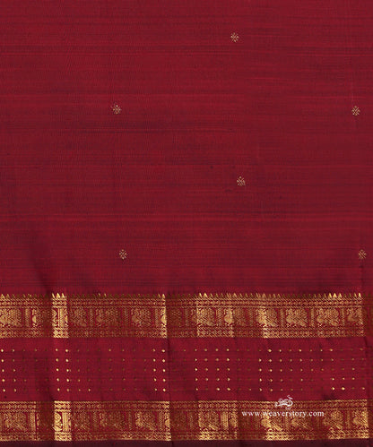 Maroon_Handloom_Pure_Silk_Pure_Zari_Kanjivaram_Saree_With_Small_Kollam_Motifs_And_Annpakshi_Border_WeaverStory_05