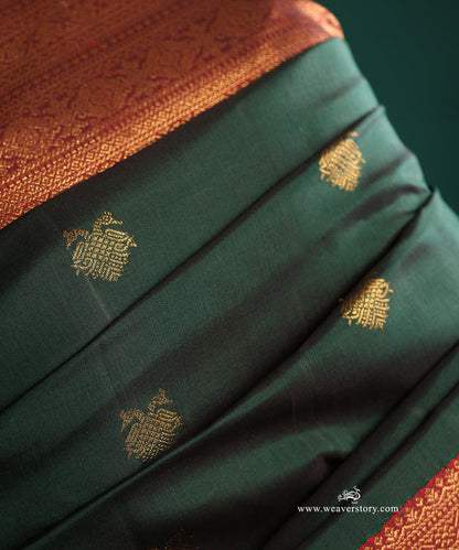 Bottle_Green_Handloom_Pure_Silk_Pure_Zari_Kanjivaram_Saree_With_Ganderberunda_Motifs_And_Wine_Korwai_Border_WeaverStory_05