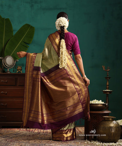 Pastel_Green_And_Gold_Handloom_Pure_Silk_Tissue_Kanjivaram_Saree_With_Purple_Korwai_Annapakshi_Border_WeaverStory_03