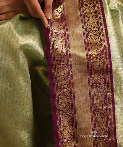 Pastel_Green_And_Gold_Handloom_Pure_Silk_Tissue_Kanjivaram_Saree_With_Purple_Korwai_Annapakshi_Border_WeaverStory_05