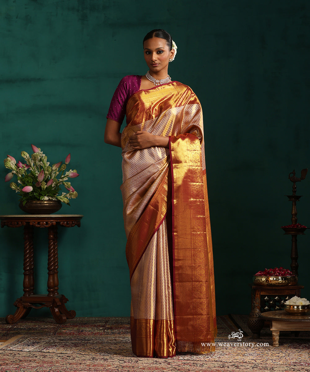 Wine_And_Gold_Pure_Tissue_Silk_Kanjivaram_Saree_With_Purple_Border_With_Chevron_And_Peacocks_WeaverStory_01