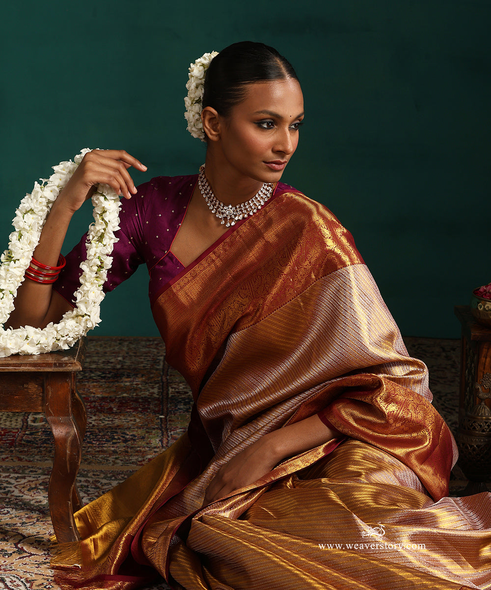 Wine_And_Gold_Pure_Tissue_Silk_Kanjivaram_Saree_With_Purple_Border_With_Chevron_And_Peacocks_WeaverStory_02