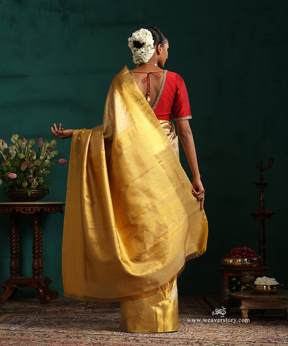 Gold_Pure_Tissue_Silk_Kanjivaram_Saree_With_Gold_Border_WeaverStory_03