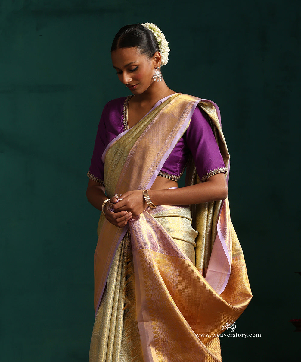 Light_Green_And_Gold_Pure_Silk_Tissue_Kanjivaram_Saree_With_Lilac_Border_WeaverStory_02