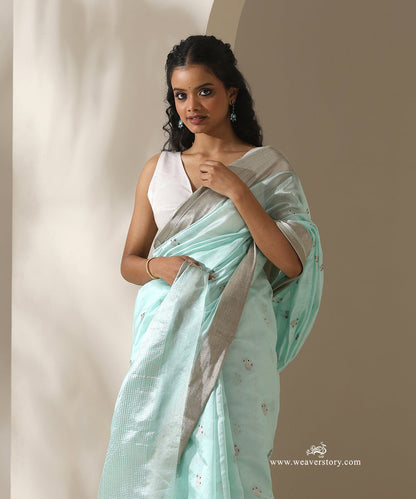 Ice_Blue_Handloom_Pure_Silk_Chanderi_Eknaliya_Saree_With_Blue_Meena_Small_Booti_And_Silver_Zari_Saffron_Border_WeaverStory_02