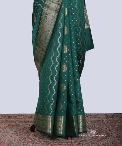 Green_Handloom_Pure_Chiniya_Silk_Banarasi_Saree_With_Gold_Zari_Flower_Border_WeaverStory_03