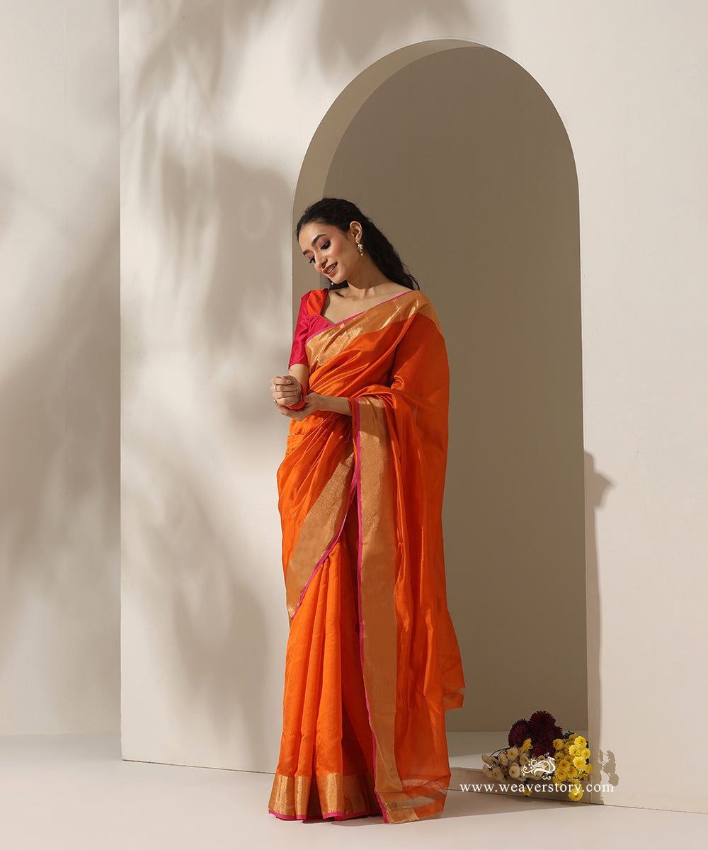 Orange_Handloom_Silk_Chanderi_Saree_With_Pink_Selvedge_Golden_Zari_Border_WeaverStory_01