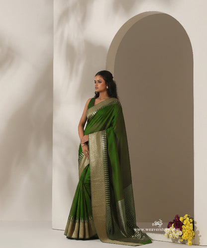 Olive_Green_Handloom_Plain_With_Broad_Border_Cotton_Silk_Chanderi_Saree_WeaverStory_01