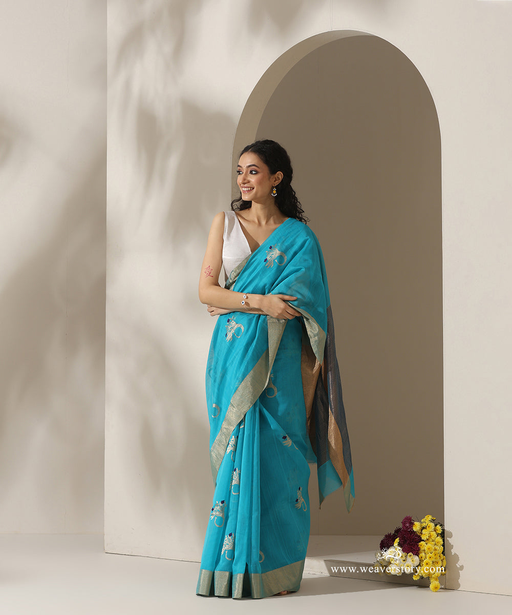 Turquoise_Blue_Handloom_Trumpet_Motif_Cotton_Silk_Chanderi_Saree_WeaverStory_01