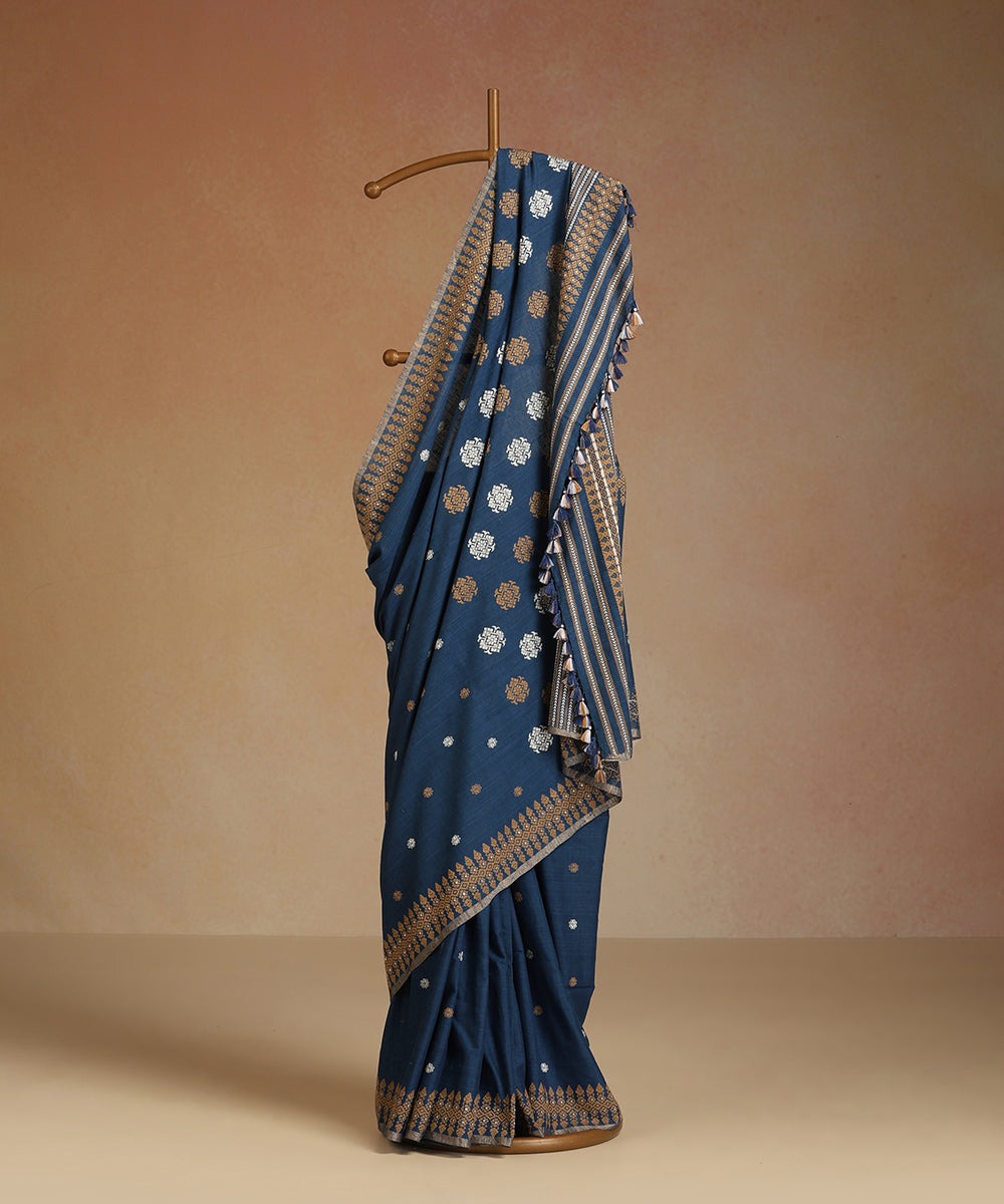 Blue_Handloom_Pure_Eri_Silk_Assam_Indigo_Dye_Saree_With_Beige_And_White_Small_And_Big_Floral_Booti_And_Beige_Border_WeaverStory_01