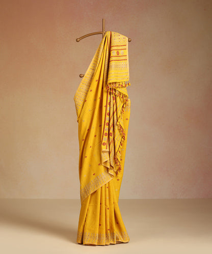 Yellow_Handloom_Pure_Eri_Silk_Turmeric_Dye_Saree_With_Red_And_Beige_Meena_WeaverStory_01