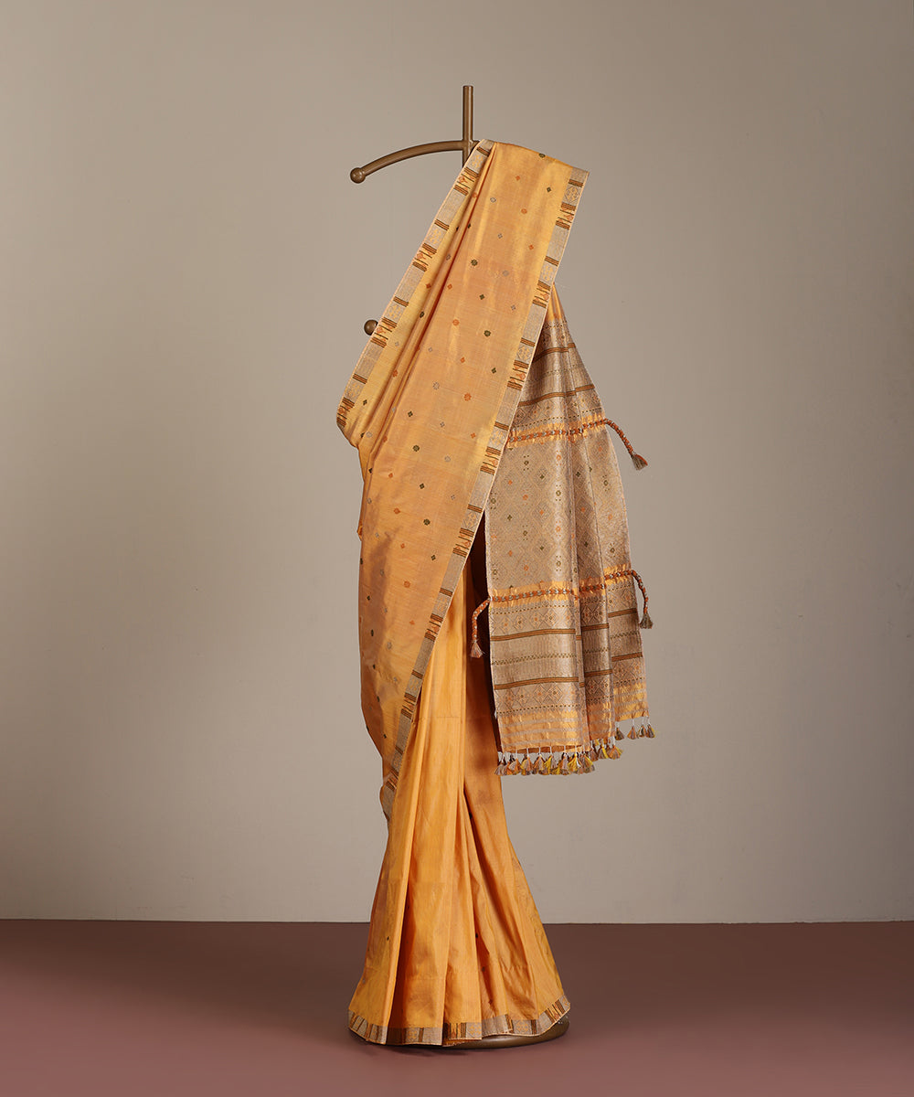 Dual_Tone_Handloom_Raw_Mulberry_Silk_Turmeric_Dye_Saree_With_Pista_Floral_Booti_WeaverStory_01