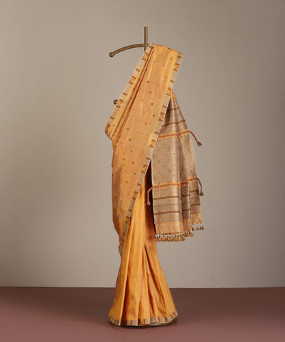 Dual_Tone_Handloom_Raw_Mulberry_Silk_Turmeric_Dye_Saree_With_Pista_Floral_Booti_WeaverStory_01