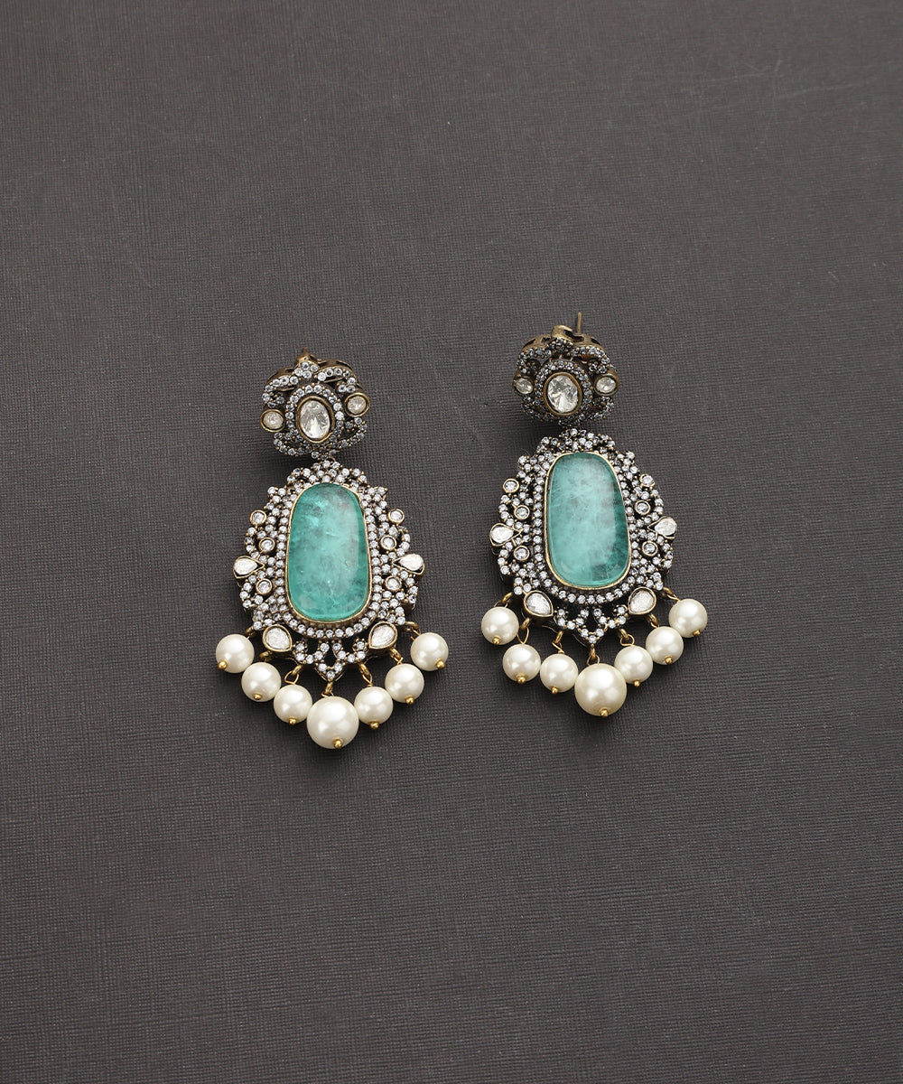 Dhanyasri_Handcrafted_Silver_Alloy_Earrings_With_Blue_Semi_Precious_Stones_WeaverStory_02