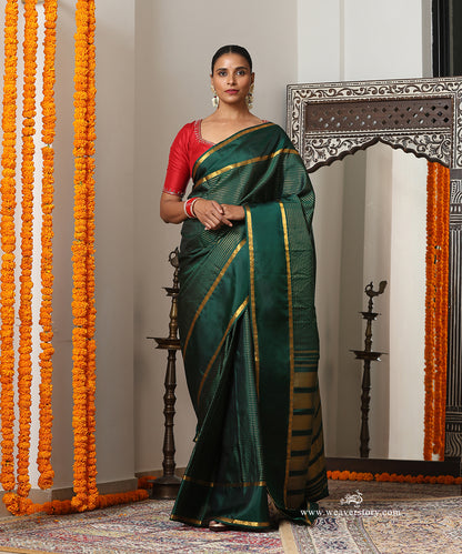 Bottle Green Handloom Pure Silk Kanjivaram Saree With Allover Horizontal Golden Zari Lines And Golden Border