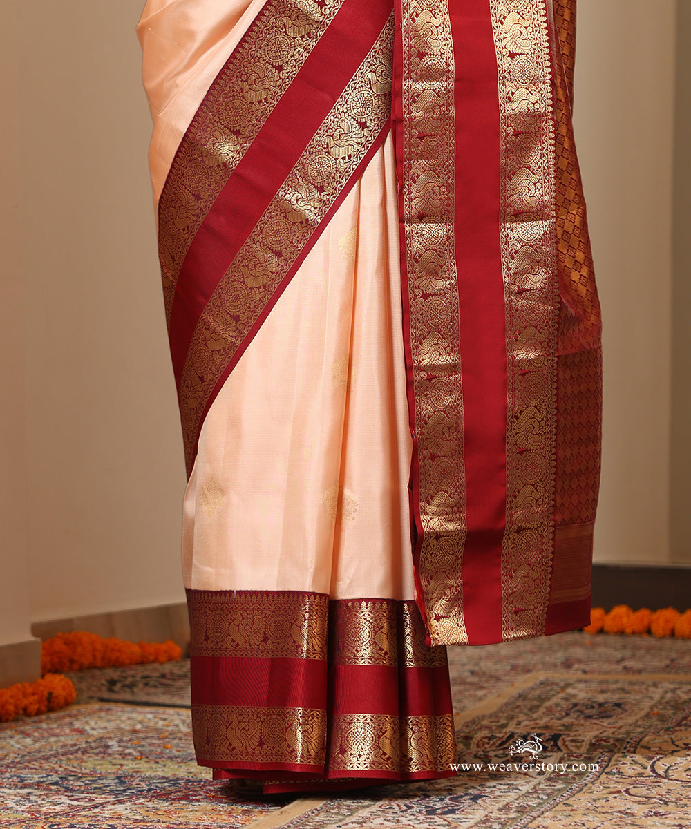 Soft Peach Handloom Pure Silk Kanjivaram Saree With Annapakshi Motifs On Maroon Border