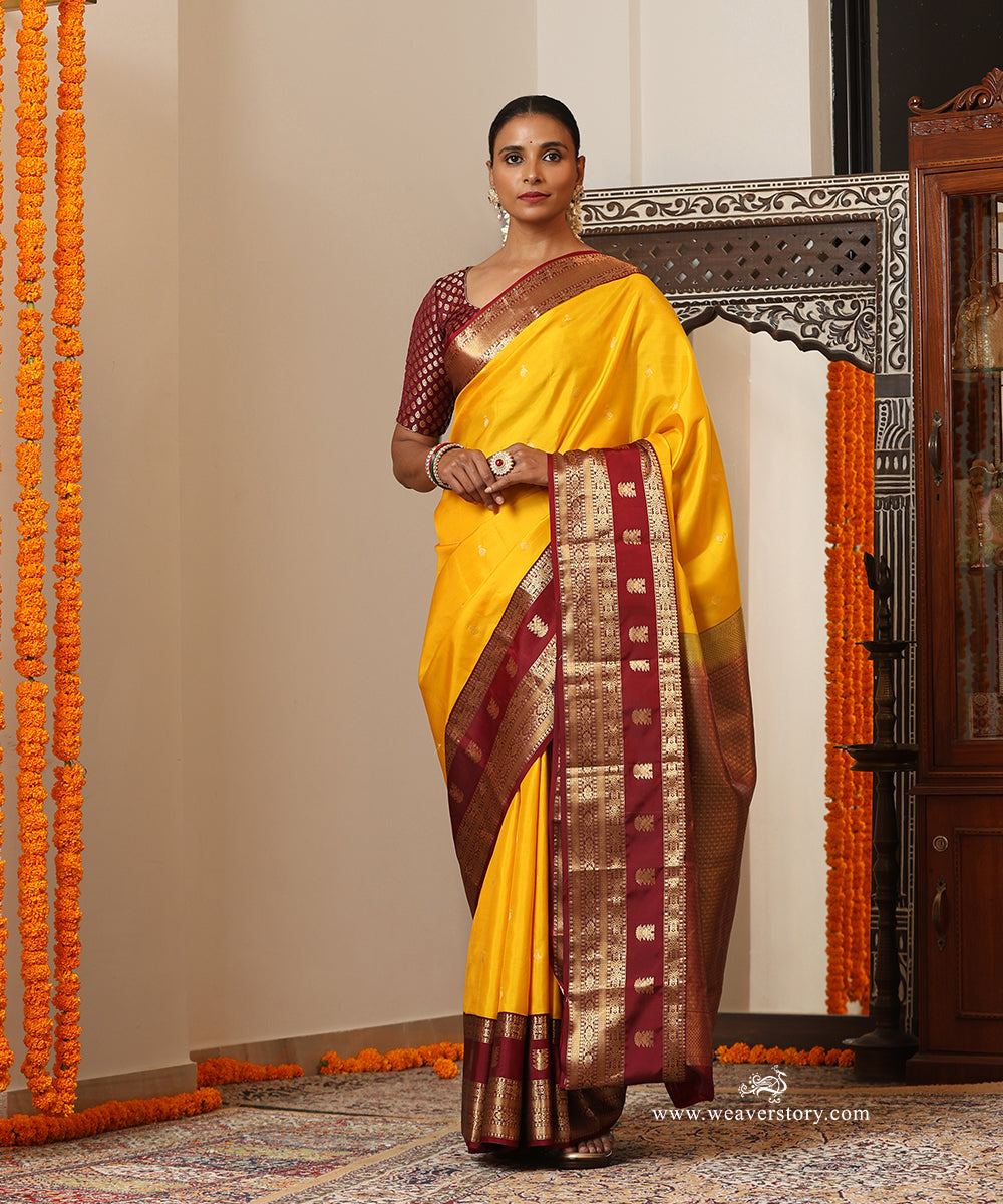 Yellow Handloom Pure Silk Kanjivaram Saree With Deep Maroon Border And Gold Zari Booti