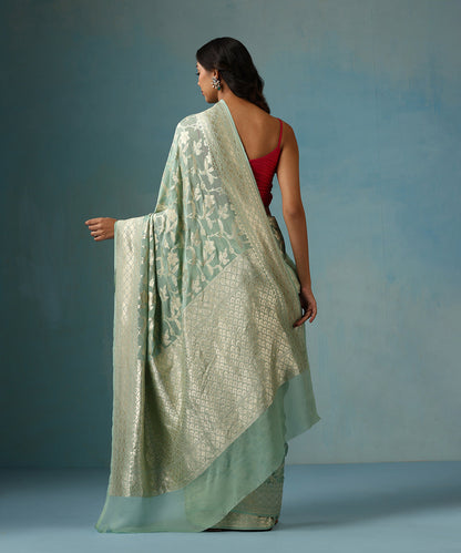 Powder_Blue_Handloom_Pure_Georgette_Banarasi_Saree_With_Allover_Cutwork_Floral_Jaal_WeaverStory_03